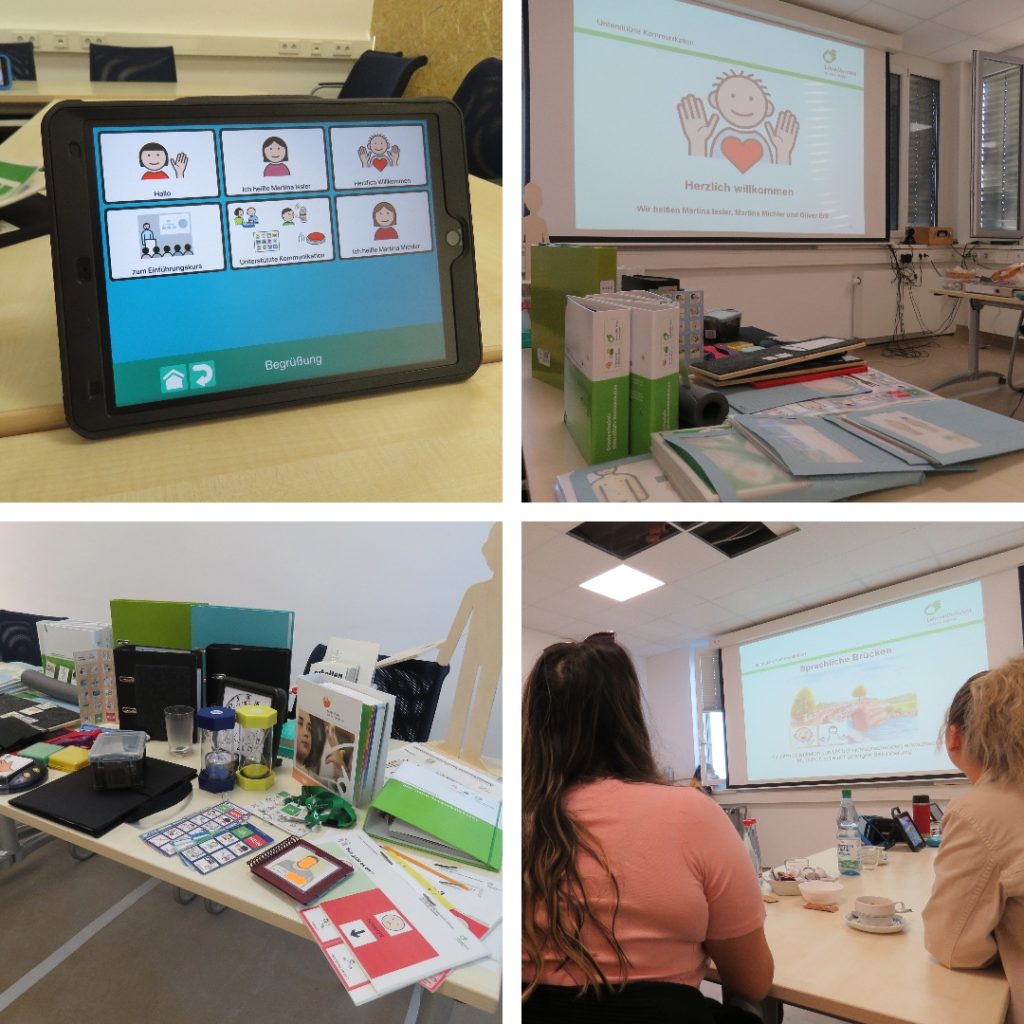 Workshop zur Unterstützten Kommunikation mit Tablet, Lernmaterialien und Teilnehmern in einem Seminarraum.