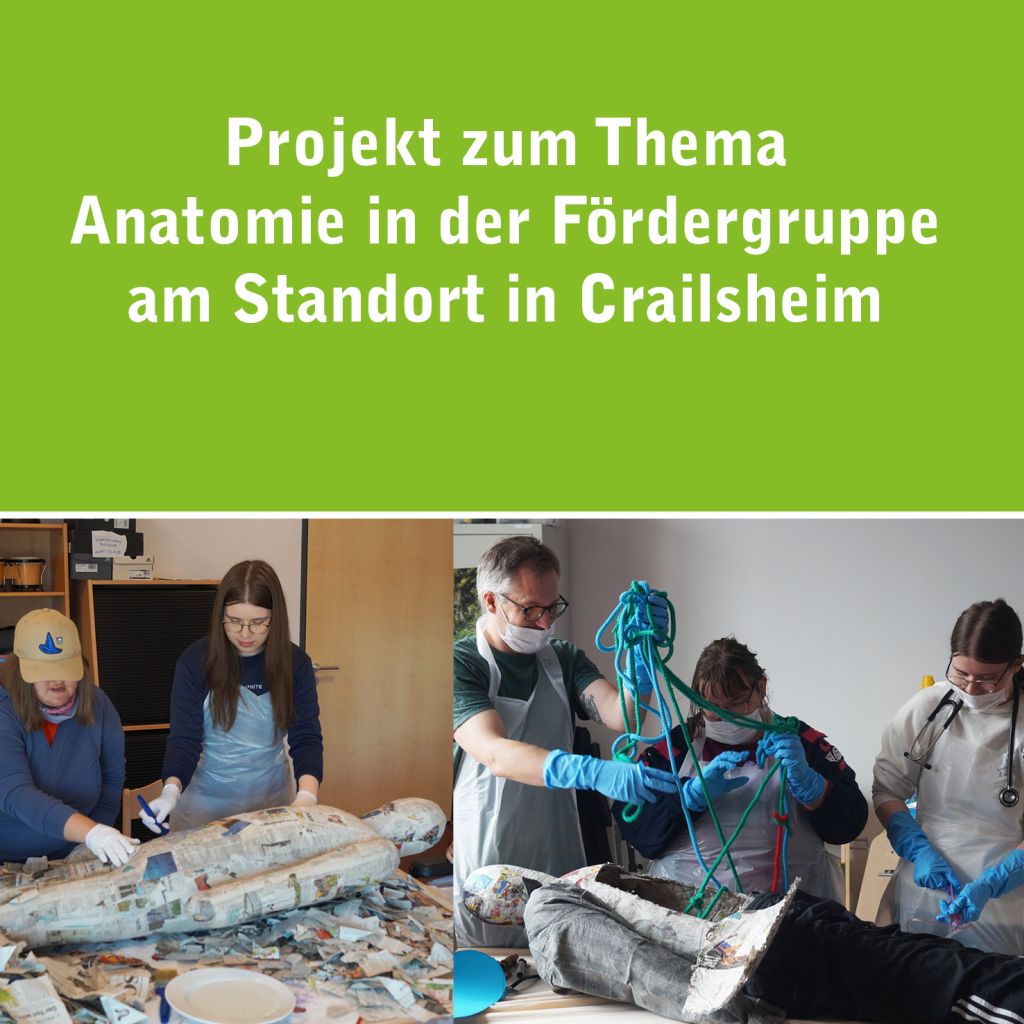 menschen stehen um einen körper aus pappmaschee der auf einem tisch liegt
